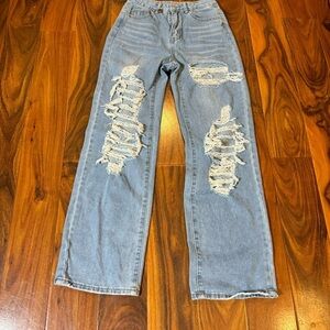 Jeans women’s size XS distressed light wash blue jeans.